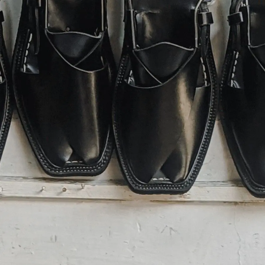 Black Peshawari chappals, finished and hanging