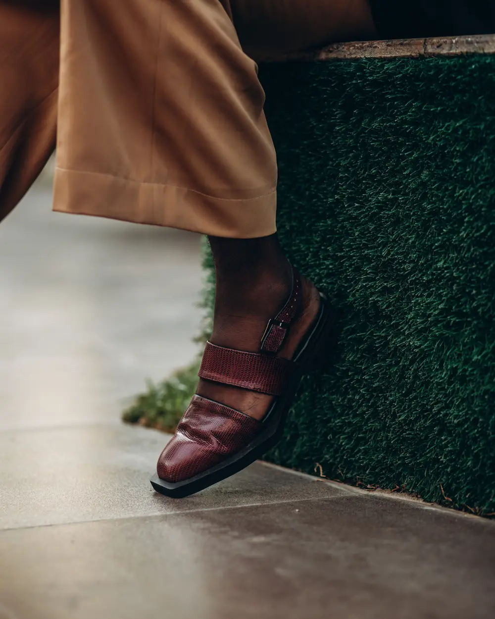Side view of a maroon Peshawari chappal