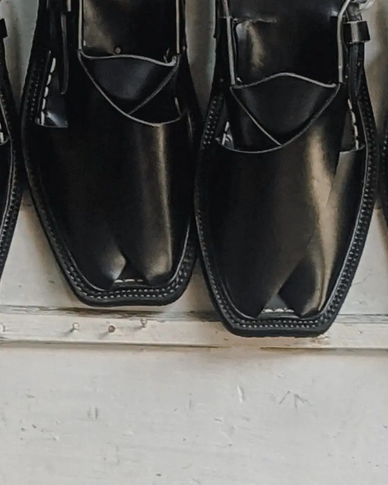 Black Peshawari chappals, finished and hanging